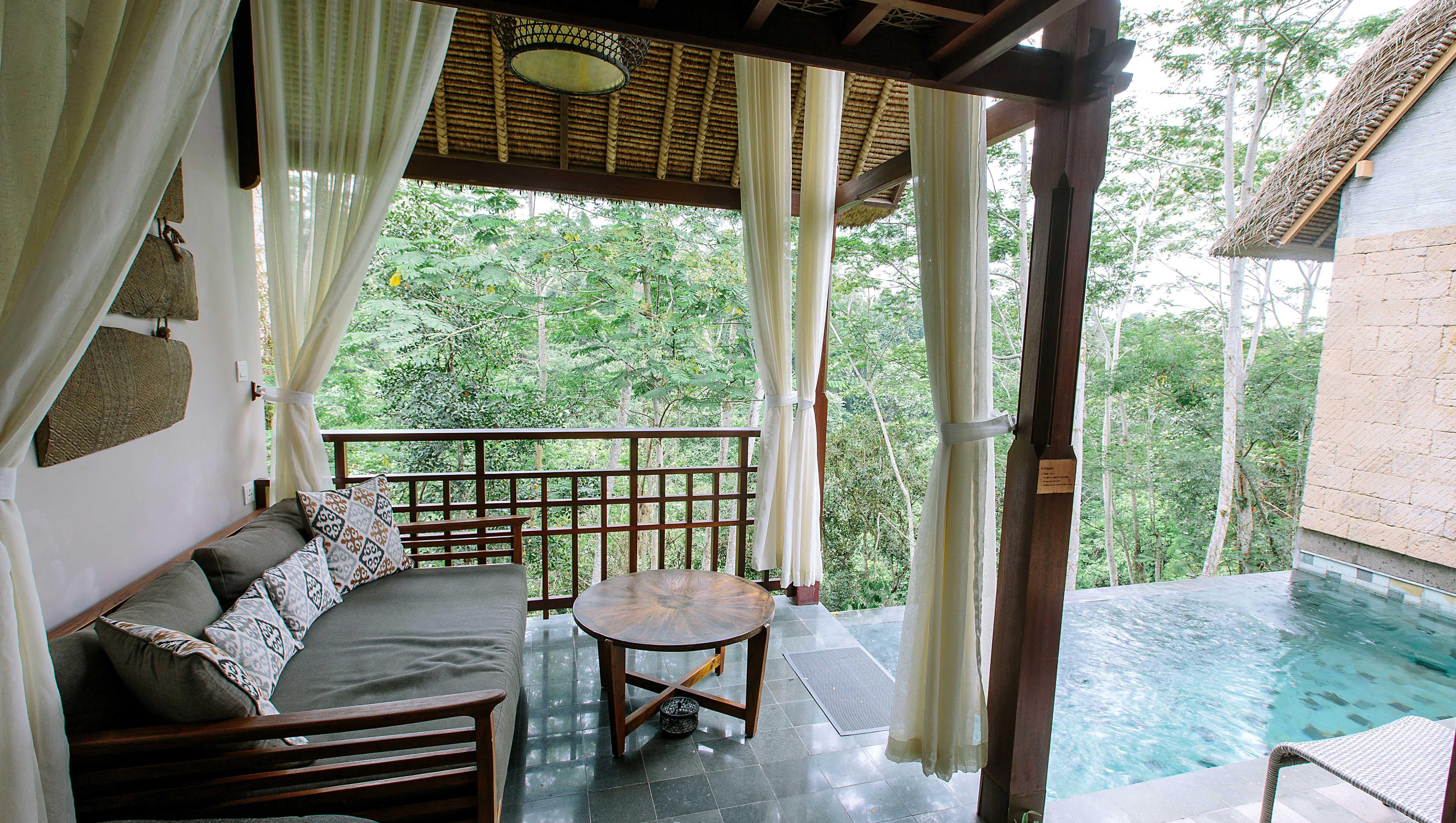 Tejaprana Resort&Spa - CHSE Certified Ubud Exterior foto A view of the pool at the resort
