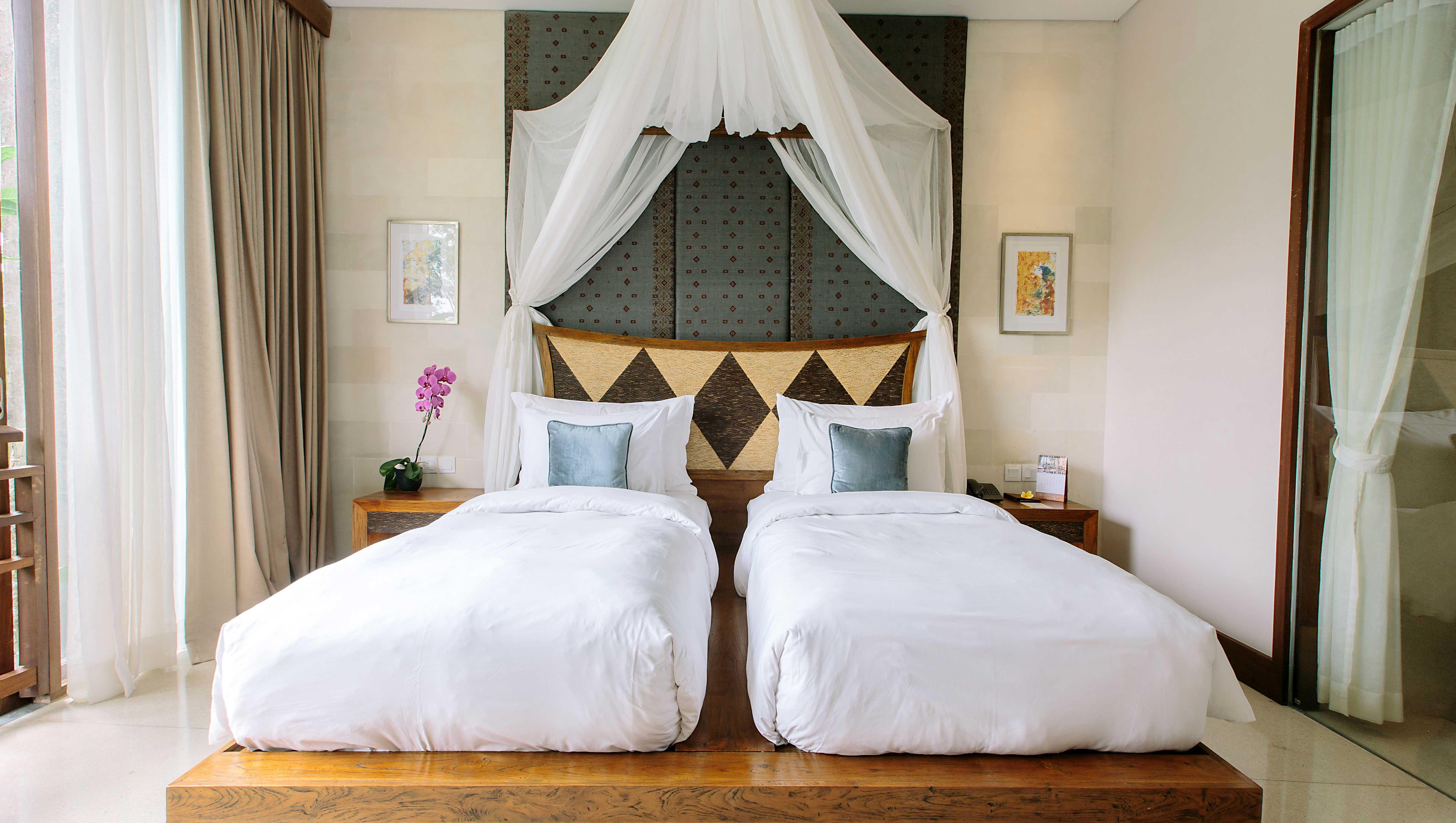 Tejaprana Resort&Spa - CHSE Certified Ubud Exterior foto A bed with mosquito netting